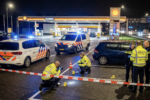 Strzelanina w Muiden - policyjna taśma na stacji benzynowej.